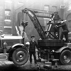 Firefighters operating a Dennis breakdown lorry