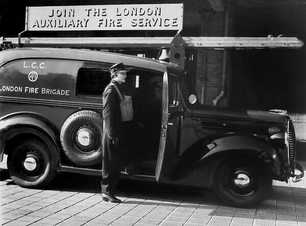 Auxiliary Fire Service member with van, WW2
