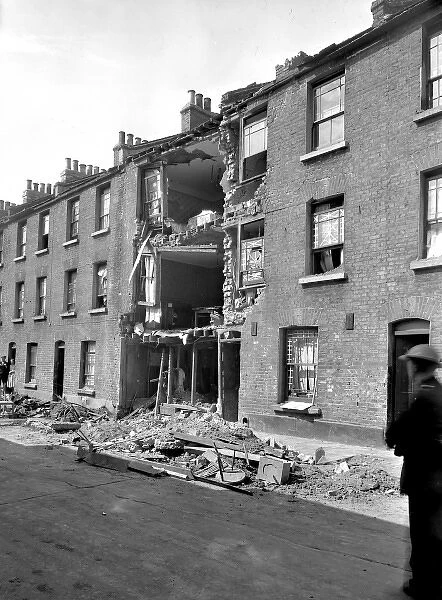 Bomb damage to a building in Ernest Street, London, WW2