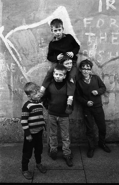 Boys with IRA graffiti, Belfast, Northern Ireland