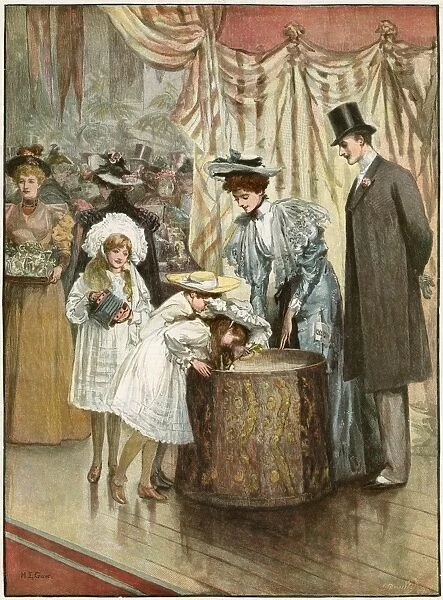 BRAN TUB. Children plunge their arms into the Bran Tub to obtain their present at a party
