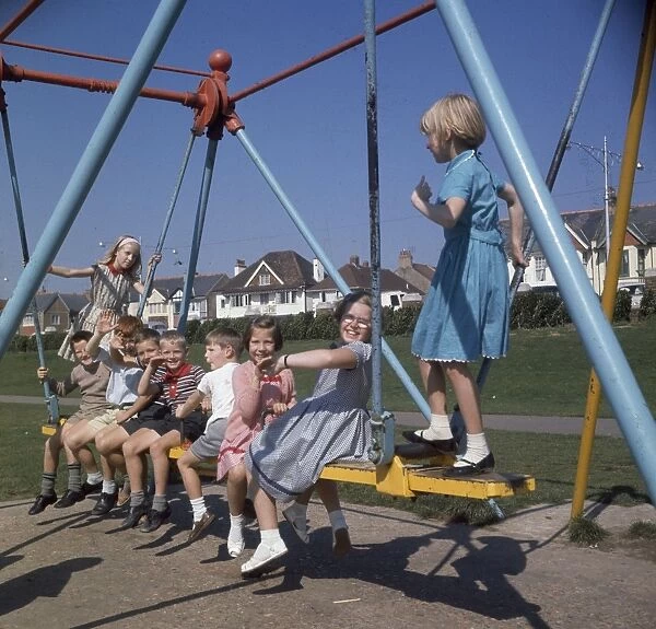 Children on a swing in a park