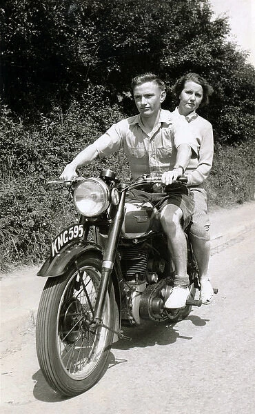 Couple on a 152 BSA motorcycle