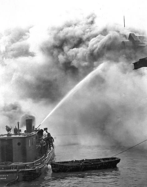 A fireboat tackling a blaze on the River Thames