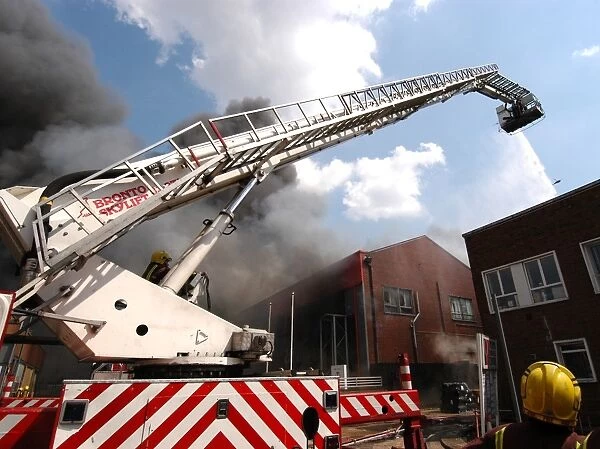 Firefighters in action at a fire, VDC House, Wembley