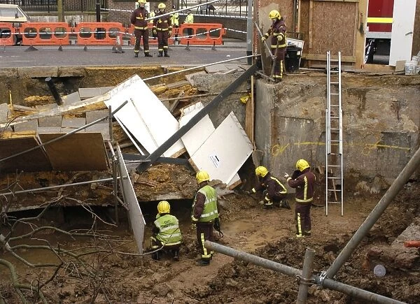Firefighters attend collapse at building site