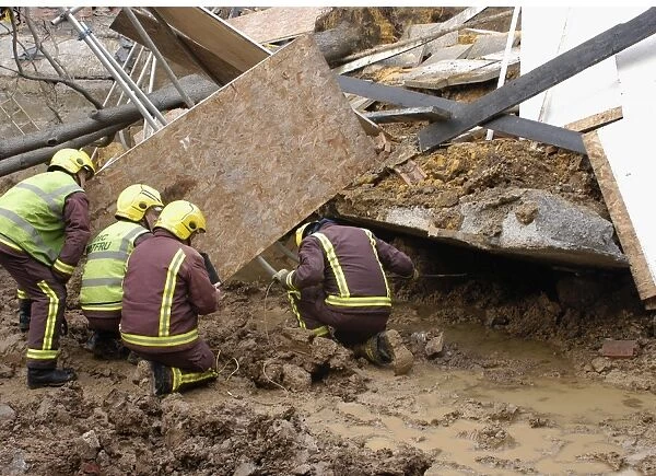 Firefighters attend collapse at building site