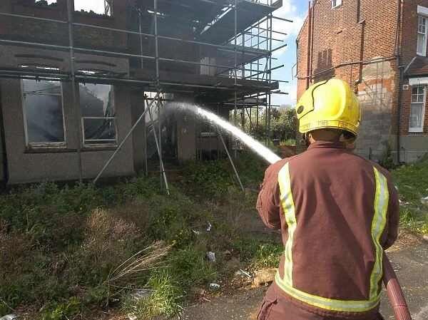 Firefighters attend a house fire at Rydal Road