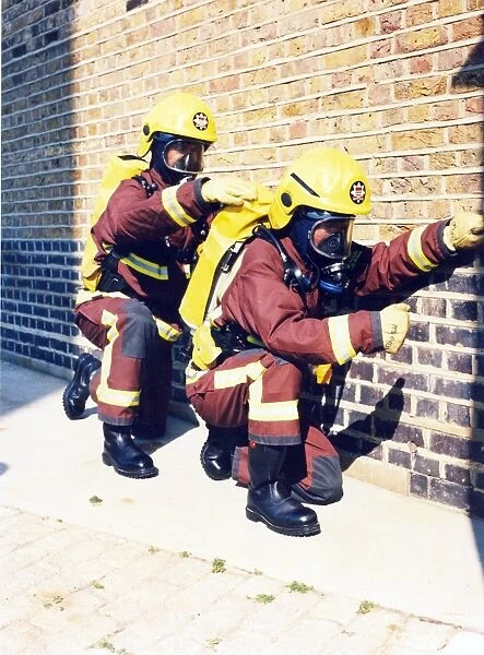 Firefighters in training with breathing apparatus