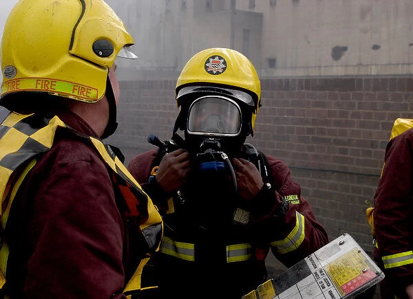 Firefighters wearing breathing apparatus