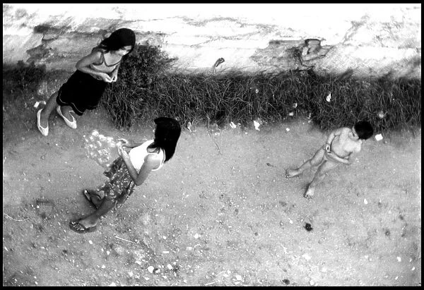 Gypsy children in the street, Valencia, Spain