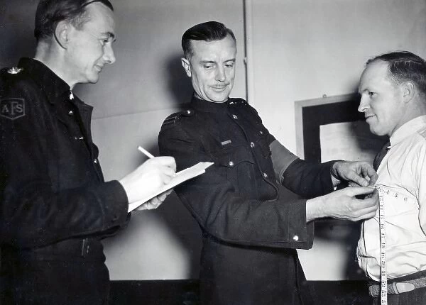 LCC-LFB AFS volunteer measured for uniform, WW2