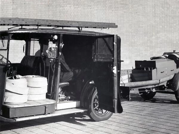 LFB adapted London taxi pulling a trailer pump, WW2