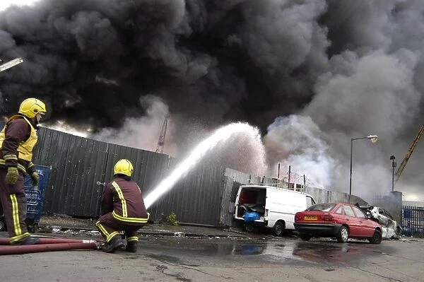 London Fire Brigade firefighters respond to a fire