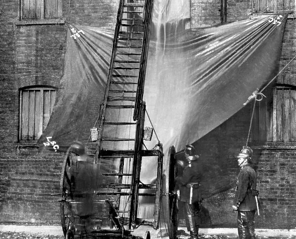 London Salvage Corps at work with salvage sheets