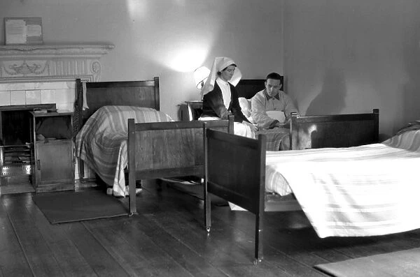 Nurse and patient in a Red Cross convalescent home