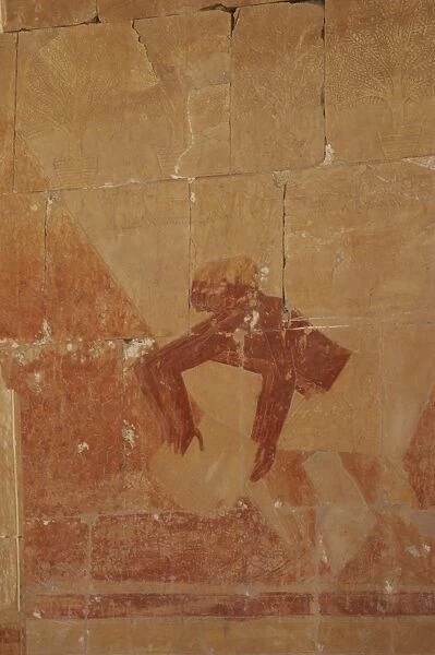 Polychrome reliefs depicting an Egyptian worker. Deir el-Bah