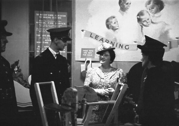Queen Elizabeth at Harrods meeting NFS firefighters, WW2