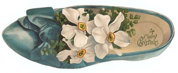 White flowers in a shoe-shaped Christmas card
