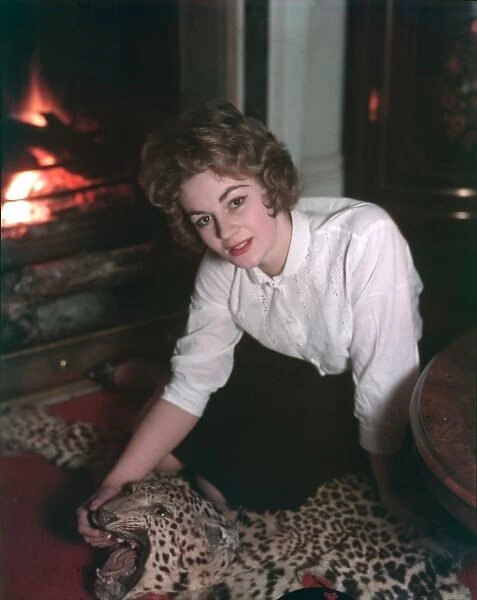 Woman on Rug by Fire