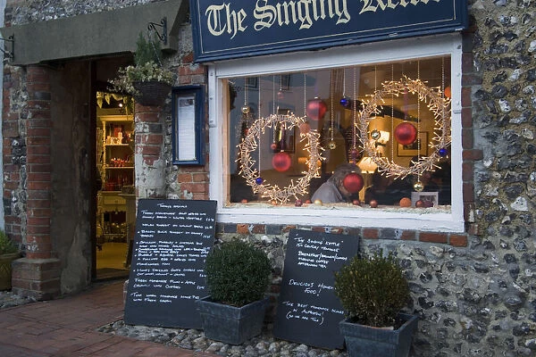 20083653. ENGLAND East Sussex Alfriston Cafe with window decorated for Christmas