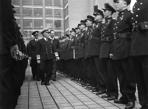 Admiral inspecting firefighters, London
