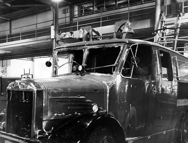 Blitz in London -- bomb damaged pump vehicle, WW2