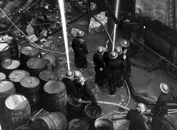 Blitz in London -- firefighters at work in Bermondsey, WW2