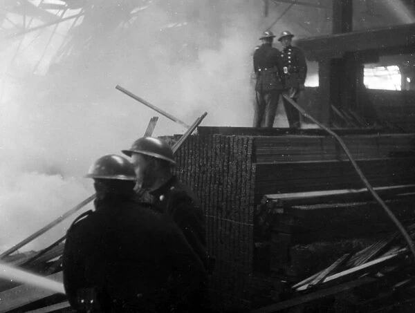 Blitz in London -- Howards Timber Yard, Poplar, WW2