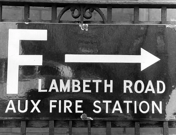 Enamel sign pointing to Lambeth Road Fire Station