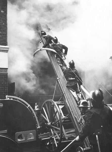 Firefighters in action, Eagle Street, London WC1