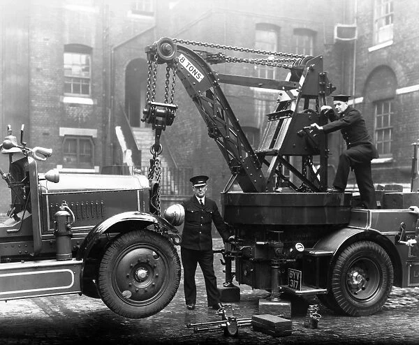 Firefighters operating a Dennis breakdown lorry