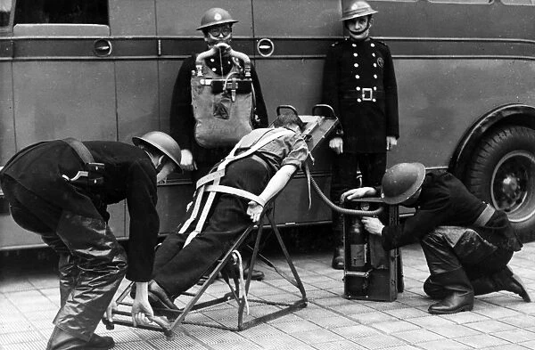 Firefighters in training with resuscitation stretcher