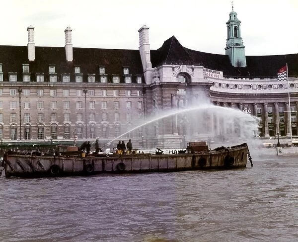 LFB fireboat in action outside County Hall, London