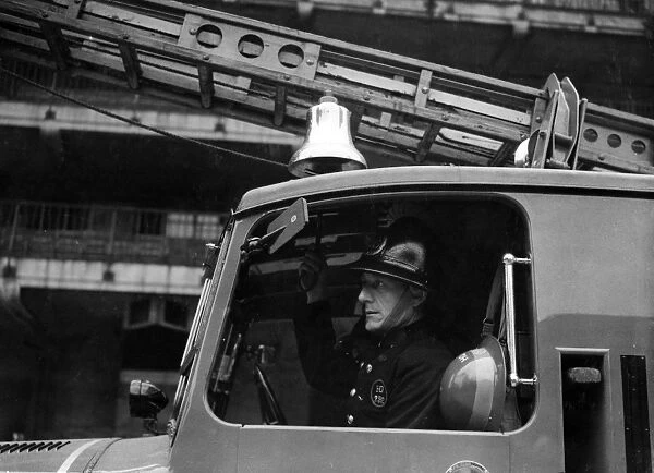 LFB firefighter in enclosed pump vehicle