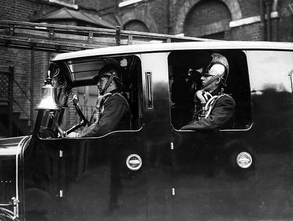 LFB firefighters in enclosed pump vehicle