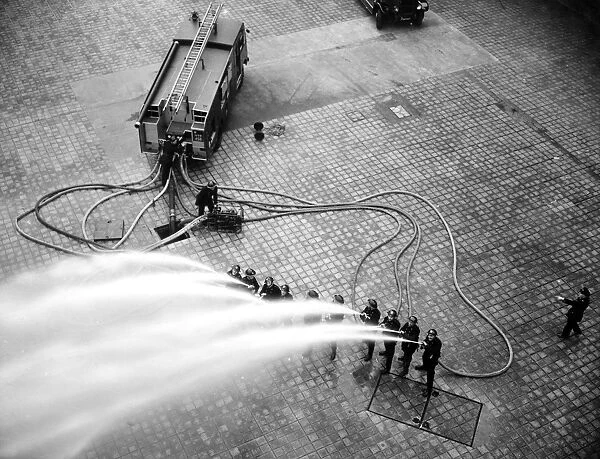 LFB firefighters in multi-hose display