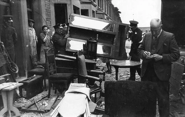 Salvage operation in Victoria Park Road, East London, WW2
