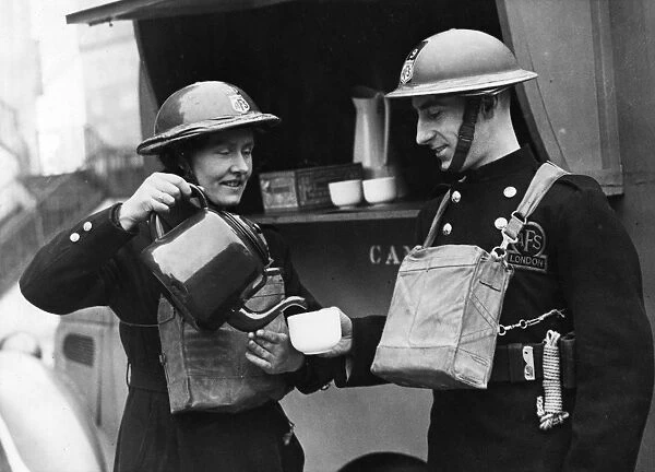 Tea break for AFS man and woman, London, WW2