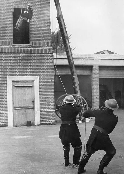 Trainee lowered from tower during exercise drill, WW2