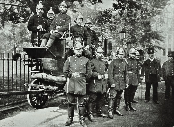 London Fire Brigade: group of firemen, with engine and turncocks, 1895 (b  /  w photo)
