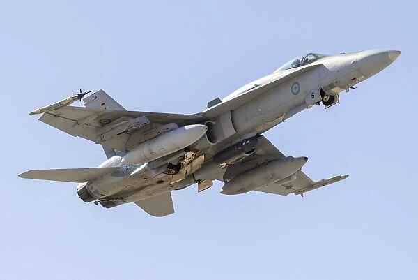 A Royal Australian Air Force F  /  A-18A Hornet taking off