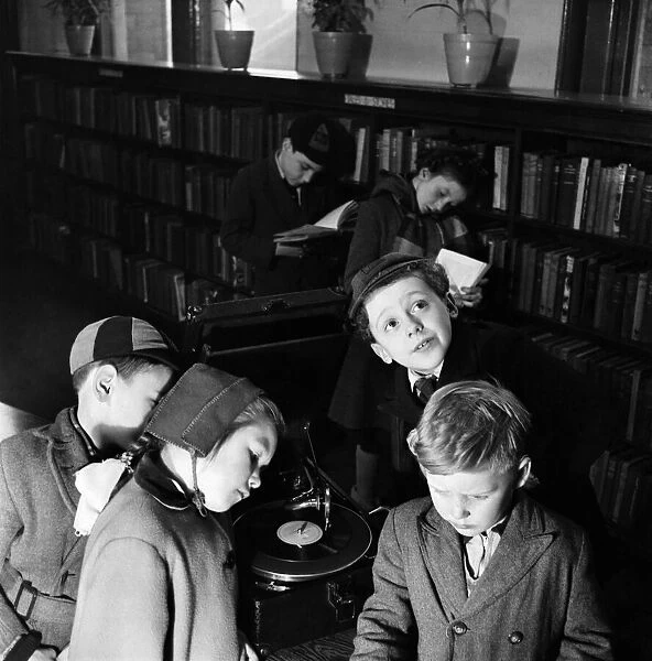Children listerning to talking books at Bermondsey Library. January 1953 C6332
