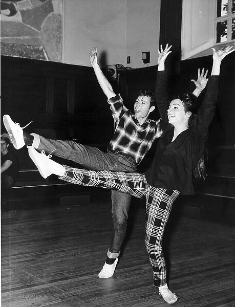 Liza Minnelli and Cliff Richard dancing together during their rehearsals for a London