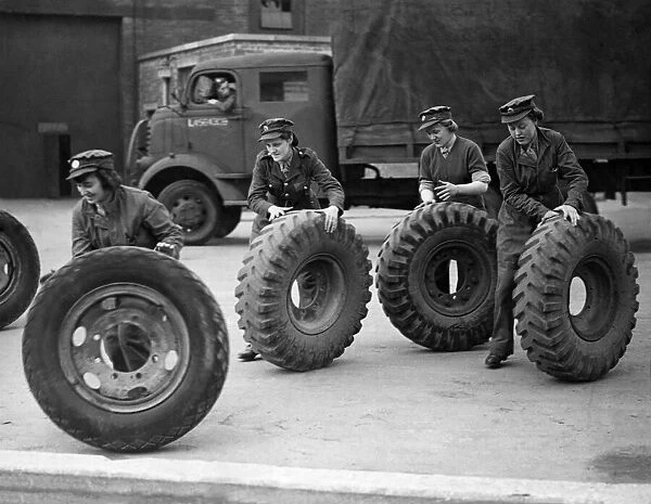 Who pinched the lorry? ATS girls at Western Command Ordinance factory rolling out tyres