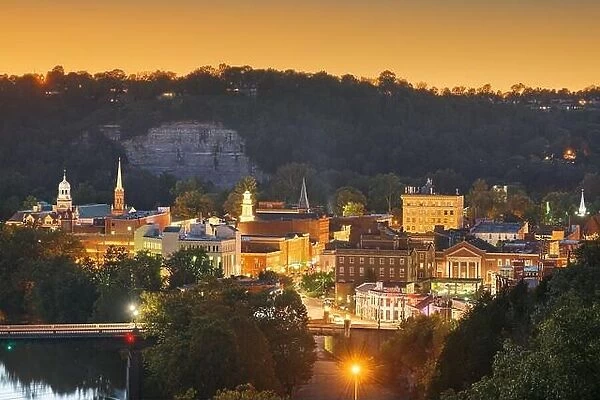 Frankfort, Kentucky, USA town skyline on the Kentucky River at dusk