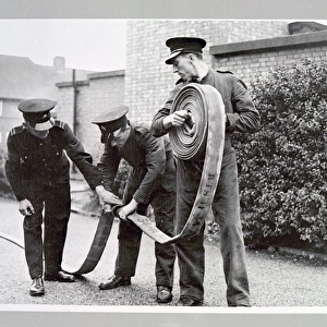 AFS volunteers undergoing hose drill, WW2