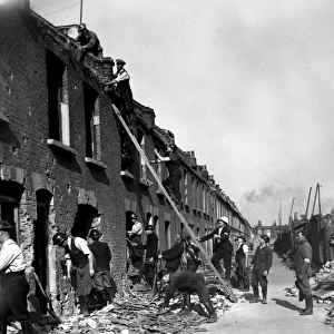Blitz in London -- rescue workers in bombed street, WW2