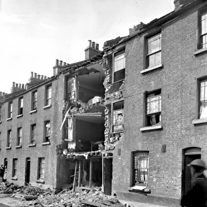 Bomb damage to a building in Ernest Street, London, WW2