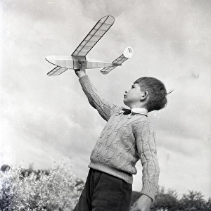 Boy with a model aeroplane